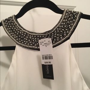 Beautiful neckline w pearls sleeveless top